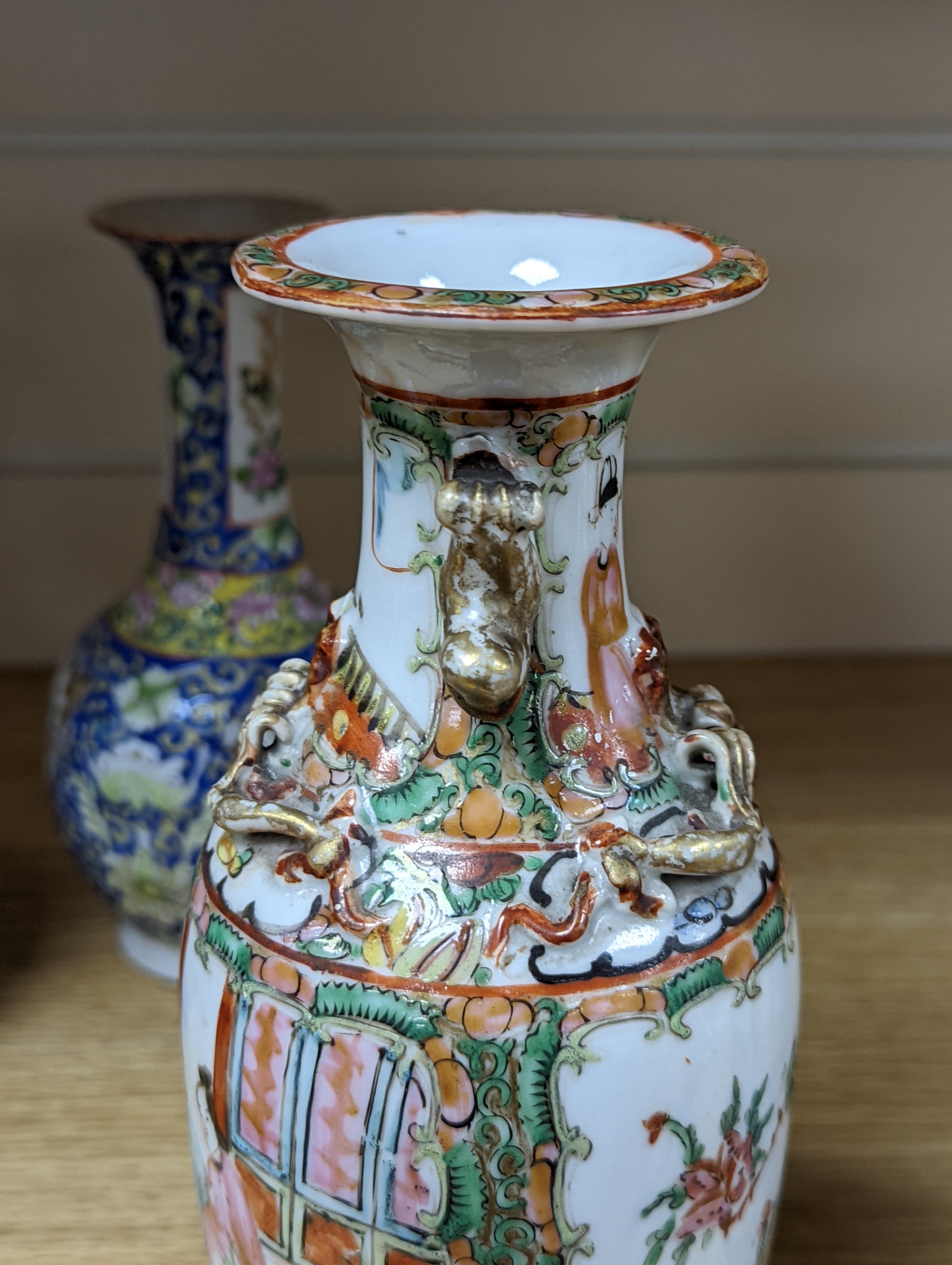 Four 19th century Chinese famille rose vases, 21cm